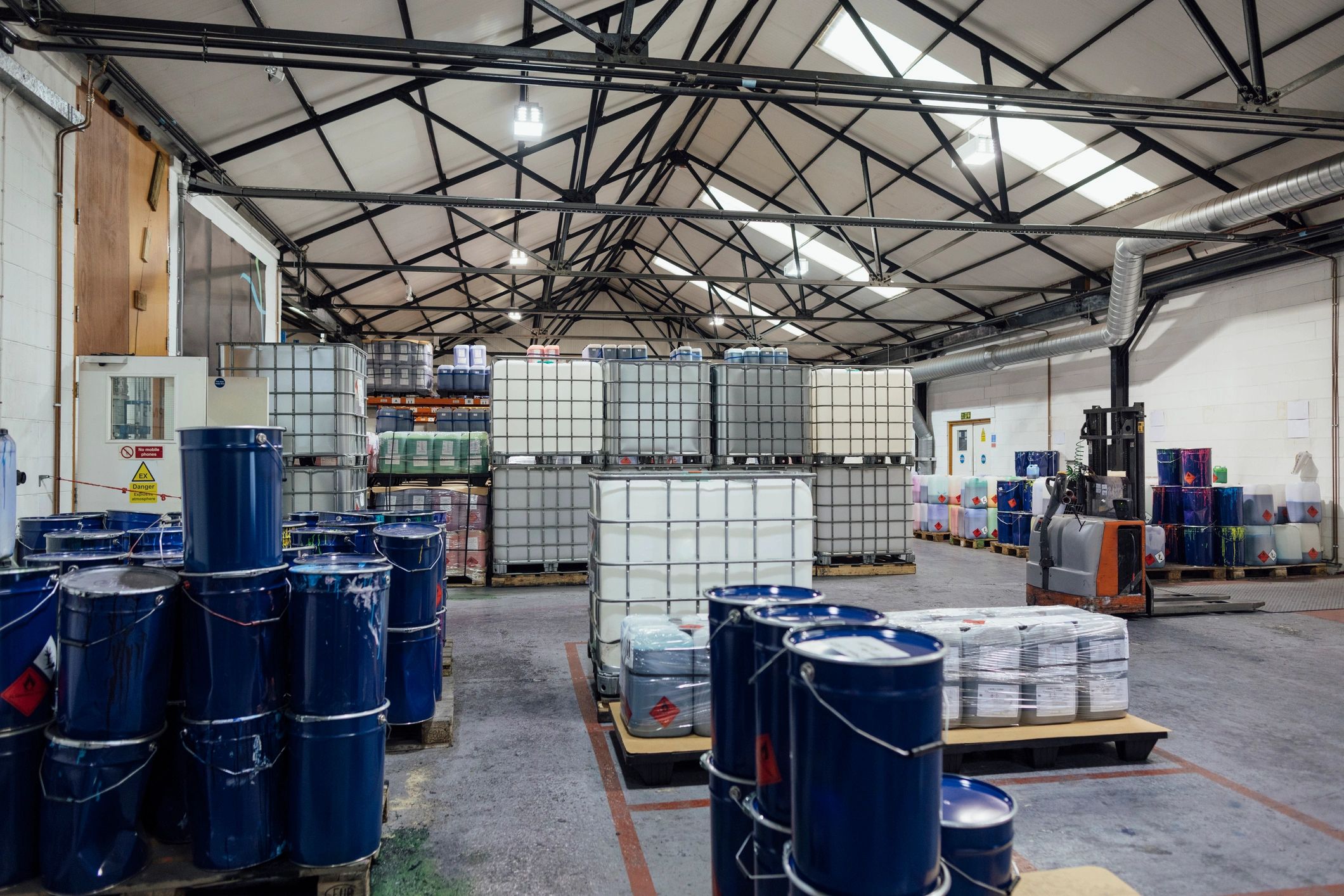 Ink factory warehouse representing packaged product dispatch